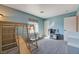 bedroom with a built-in loft and ladder, and minimalist modern decor at 608 Breezy Sage Ct, Henderson, NV 89015