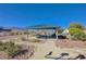 Community area with picnic tables and desert landscaping at 608 Breezy Sage Ct, Henderson, NV 89015