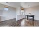 Neutral entryway with dark wood floors, bright white walls, and lots of sunlight at 608 Breezy Sage Ct, Henderson, NV 89015