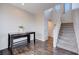 Entryway showing staircase, hardwood floors, and natural light at 608 Breezy Sage Ct, Henderson, NV 89015