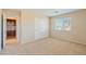 This bedroom features a closet and window offering bright and comfortable space at 6337 Black Mane Way, North Las Vegas, NV 89081