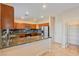 Granite countertops and stainless steel appliances highlight this kitchen at 6337 Black Mane Way, North Las Vegas, NV 89081