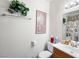 Bathroom featuring a single sink vanity, framed mirror, and a shower at 6630 Bubbling Brook Dr # C, Las Vegas, NV 89107