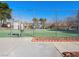 View of the community tennis court that is fenced in and ready for play at 6630 Bubbling Brook Dr # C, Las Vegas, NV 89107