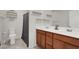 Bathroom with double sink vanity, and a decorative shelf at 6988 Sylmar Ave, Las Vegas, NV 89113