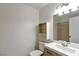 Clean bathroom with white fixtures, vanity, and a shower-tub combination at 7100 Pirates Cove Rd # 2067, Las Vegas, NV 89145