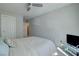 Bedroom featuring neutral walls, carpeting, ceiling fan and adjoining rooms at 720 Sleeping City Ave, Henderson, NV 89015