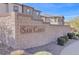 San Carlo community entrance with block wall and desert landscaping at 720 Sleeping City Ave, Henderson, NV 89015