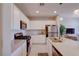 Bright kitchen featuring stainless steel appliances, white cabinets, spacious countertops, and an undermount sink at 720 Sleeping City Ave, Henderson, NV 89015