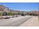 Residential street view showcasing a well-maintained neighborhood entrance and community at 720 Sleeping City Ave, Henderson, NV 89015