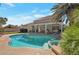 Backyard pool and spa with covered patio at 7400 Wheat Grass Ct, Las Vegas, NV 89129