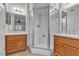 Bathroom with double sinks, tile flooring and glass shower at 7701 W Robindale Rd # 102, Las Vegas, NV 89113