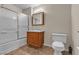 Standard bathroom featuring a shower-tub combo, toilet, and vanity at 7701 W Robindale Rd # 102, Las Vegas, NV 89113