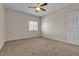 Empty bedroom with neutral walls, carpeted floor, and a window at 7701 W Robindale Rd # 102, Las Vegas, NV 89113