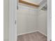 Walk-in closet features installed shelving and carpeted floor at 7701 W Robindale Rd # 102, Las Vegas, NV 89113