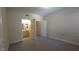 Comfortable bedroom with neutral carpet, featuring access to a bathroom and closet at 8000 W Badura Ave # 1019, Las Vegas, NV 89113