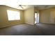 Spacious bedroom with neutral carpet and large window providing natural light at 8000 W Badura Ave # 1019, Las Vegas, NV 89113