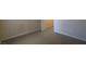 Neutral bedroom with comfortable carpeting and an open doorway at 8000 W Badura Ave # 1019, Las Vegas, NV 89113