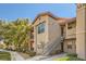 Pleasant condo complex showing stairs leading to the upper-level units at 8000 W Badura Ave # 1019, Las Vegas, NV 89113