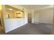 Comfortable living room offering a view of the kitchen through a half wall at 8000 W Badura Ave # 1019, Las Vegas, NV 89113
