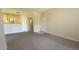 Inviting living space with neutral palette, connecting seamlessly to adjacent rooms at 8000 W Badura Ave # 1019, Las Vegas, NV 89113