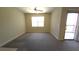 Bright living room featuring natural light and access to a balcony or patio at 8000 W Badura Ave # 1019, Las Vegas, NV 89113