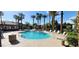 Sparkling community pool with lounge chairs, perfect for relaxing in the sun at 8000 W Badura Ave # 1019, Las Vegas, NV 89113