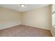 Neutral bedroom with a large window for natural light at 8234 Misty Sage St, Las Vegas, NV 89139