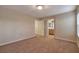 Bedroom with neutral carpet, standard closets, and an ensuite bath at 8234 Misty Sage St, Las Vegas, NV 89139