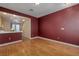 Open dining room showcasing hardwood floors and bright, natural light at 8234 Misty Sage St, Las Vegas, NV 89139