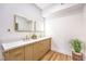 Modern bathroom featuring double vanity, modern fixtures and sleek design at 8645 Edmond St, Las Vegas, NV 89139