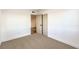 Cozy bedroom with carpet flooring and a large closet with double doors at 8645 Edmond St, Las Vegas, NV 89139