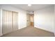 Bedroom with carpet floor, closet and a door leading to another room at 8645 Edmond St, Las Vegas, NV 89139