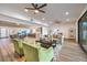 Expansive living room with seamless transition to a dining area and modern kitchen at 8645 Edmond St, Las Vegas, NV 89139