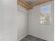 Walk-in closet featuring shelving and a window for natural light at 8699 Grand Sequoia St, Las Vegas, NV 89139