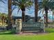 The Granada Hills community sign framed by palm trees and well-manicured landscaping at 8800 Las Olivas Ave, Las Vegas, NV 89147