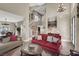 Spacious foyer showcasing a curved staircase, elegant decor, and hardwood floors, creating a welcoming ambiance at 8800 Las Olivas Ave, Las Vegas, NV 89147