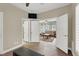 Versatile sitting room with wood-look floors, ceiling fan and comfortable furniture at 8800 Las Olivas Ave, Las Vegas, NV 89147