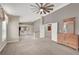 Bright and airy main bedroom with high ceilings, ceiling fan and mirrored closet doors at 8800 Las Olivas Ave, Las Vegas, NV 89147