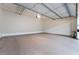 Spacious, clean garage with a neutral-toned floor, ample lighting, and visible mechanical systems overhead at 9101 Alta Dr # 207, Las Vegas, NV 89145