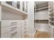 Detailed closet with custom drawers, cabinets, and shelving offering substantial storage and organization at 9101 Alta Dr # 207, Las Vegas, NV 89145