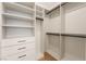 Spacious walk-in closet featuring custom shelving and drawers, providing ample storage space at 9101 Alta Dr # 207, Las Vegas, NV 89145