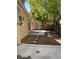 Landscaped backyard with stone pavers, and a well maintained exterior at 9286 Blue Flax Pl, Las Vegas, NV 89148