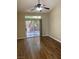 Bright bedroom featuring a sliding glass door leading to a private backyard at 9286 Blue Flax Pl, Las Vegas, NV 89148