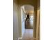 Inviting hallway leads to an open-concept living space with tile floors at 9286 Blue Flax Pl, Las Vegas, NV 89148