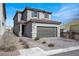 Attractive two-story home with a wide driveway, tile roof, and neat front landscaping at 9330 Brookmont Ave, Las Vegas, NV 89149