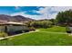 A beautifully landscaped community park with lush green lawn at 10525 Gibbous Moon Dr, Las Vegas, NV 89129