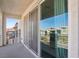 Open-air balcony with modern railings, showcasing views of the neighborhood and the mountains at 10801 Far Country Ave, Las Vegas, NV 89129