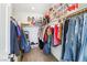 Well-organized walk-in closet with ample hanging space and shelving for storage in this home at 10801 Far Country Ave, Las Vegas, NV 89129