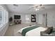 Staged main bedroom features a fireplace, plantation shutters, and neutral decor at 11158 Antonine Wall Ct, Las Vegas, NV 89141